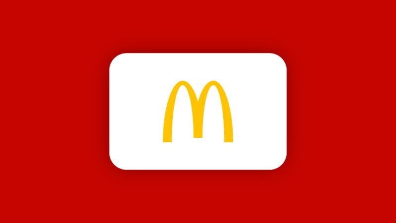 mcdonalds logo on white card with red background